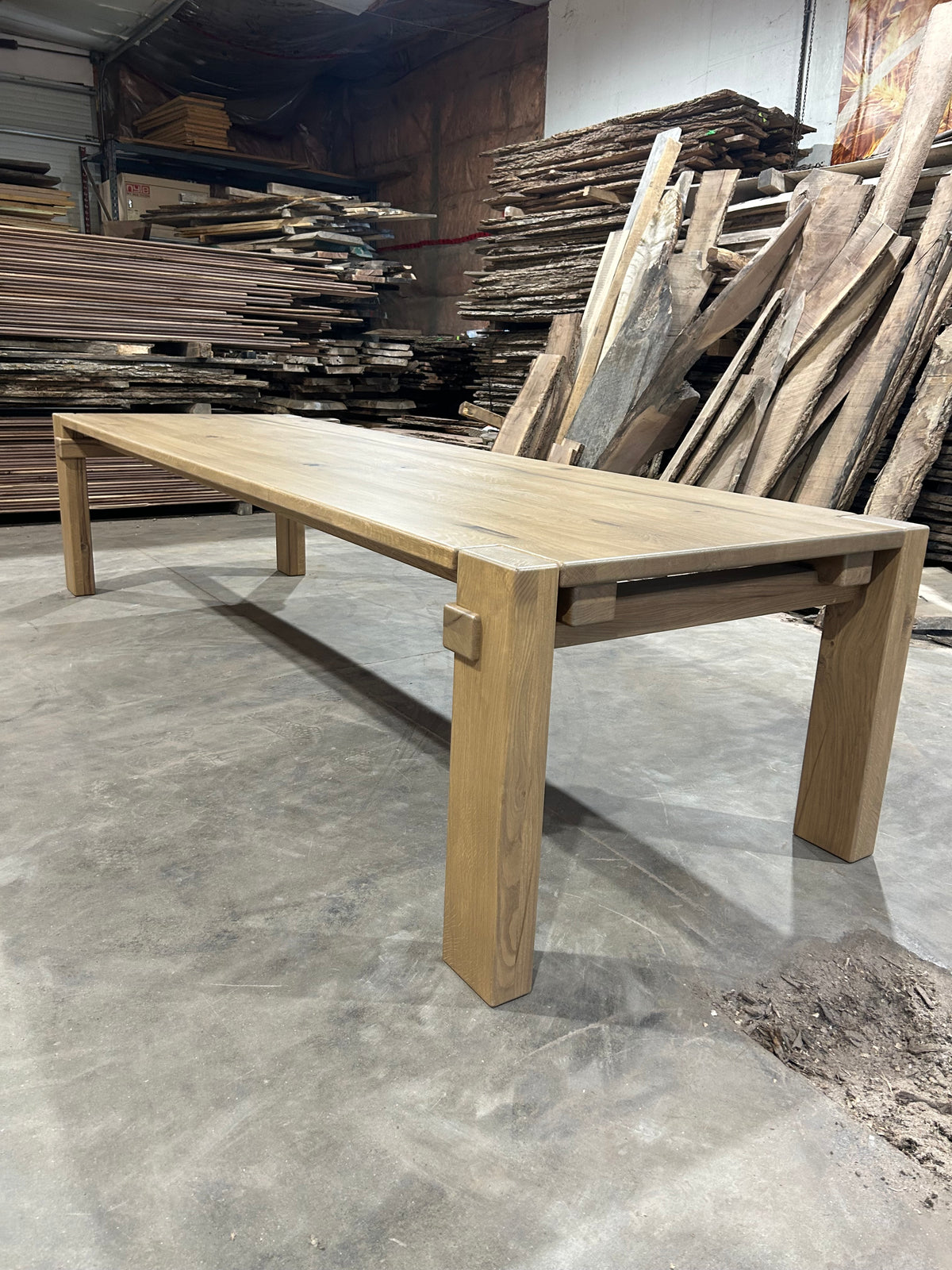 Hollis dining table with oversized legs