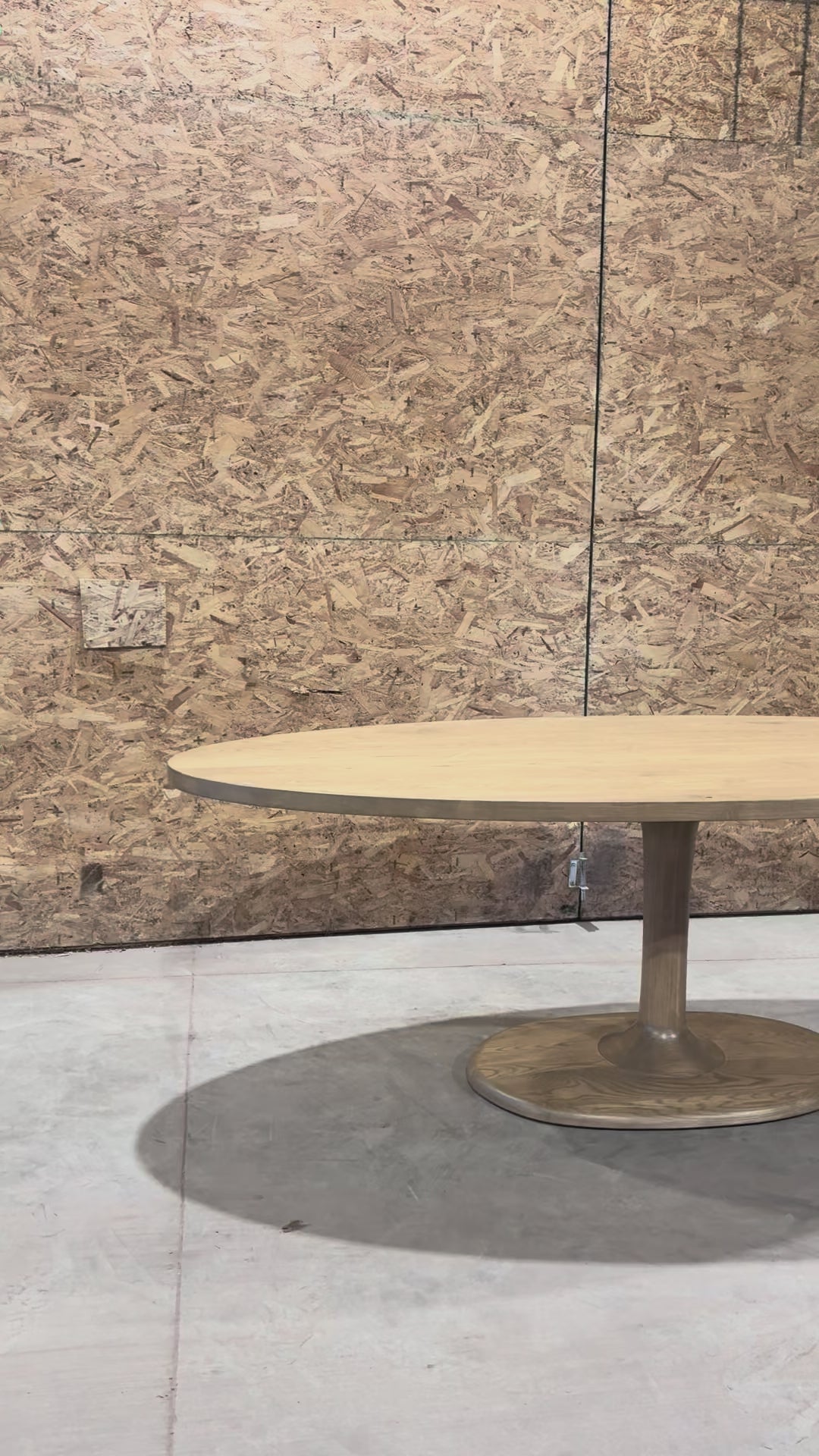 wood table with tulip base